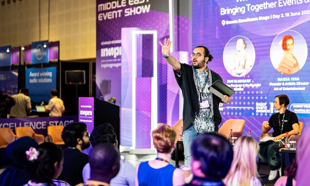 Speaker presenting on the seminar stage at the Middle East Event Show, Dubai World Trade Centre